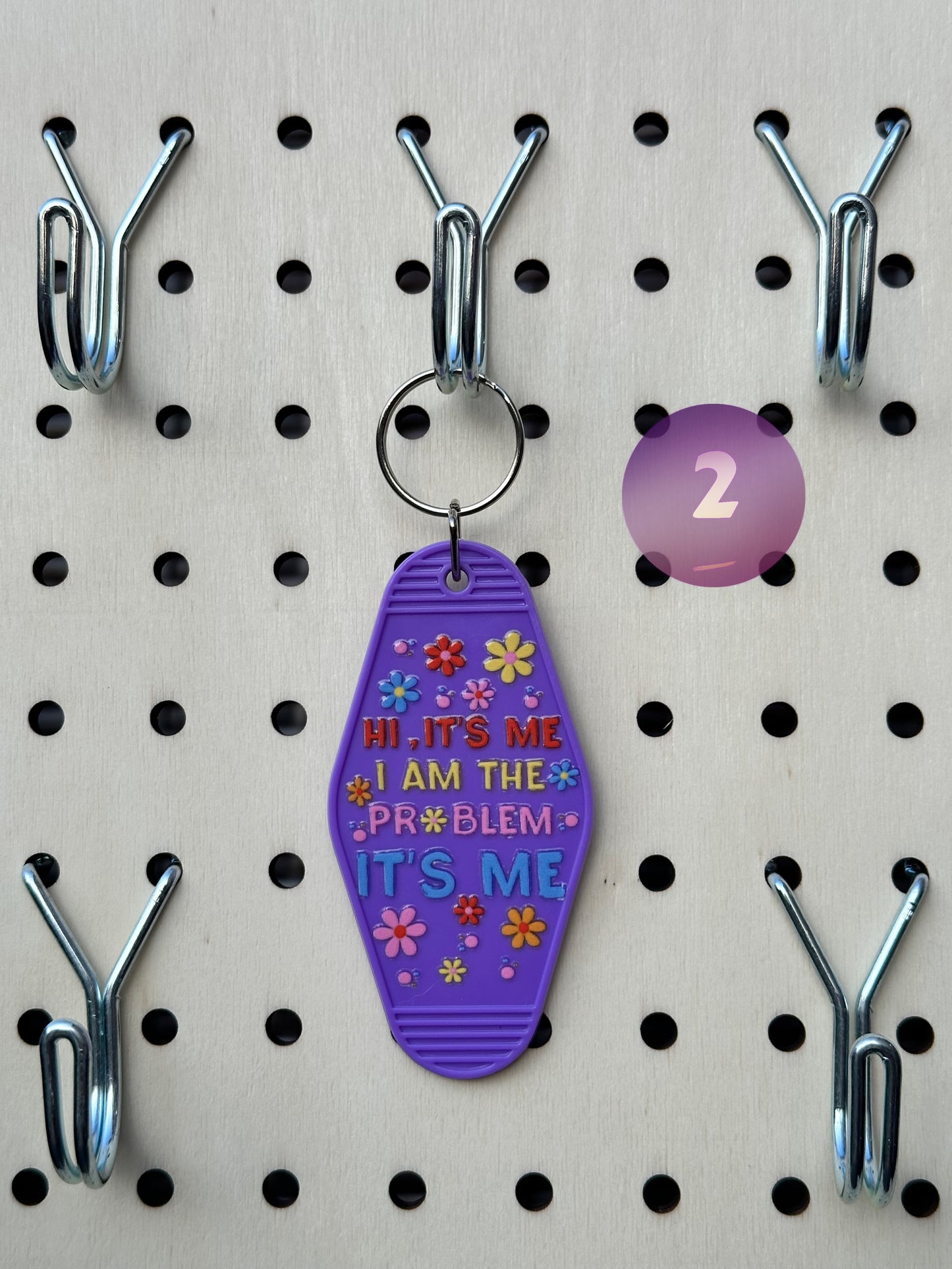 Purple Motel Keychains (Multiple Designs)